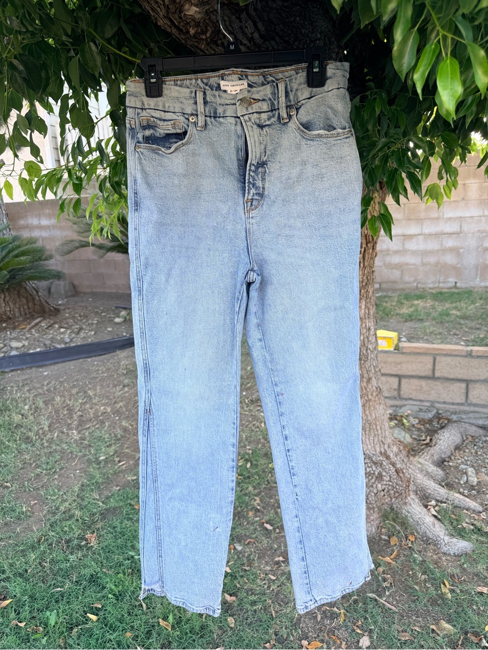 Good American Faded Light Wash Straight Leg Jeans
